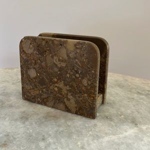 Super cute tanish marble napkin holder. No chips. Great condition!